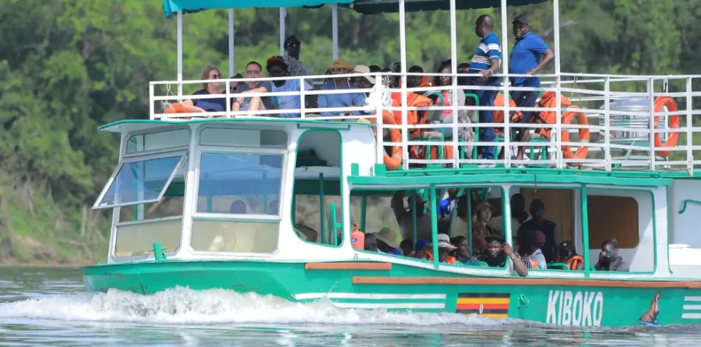 Tourists on a Boat cruise across East Africa, Uganda, Kenya, Tanzania, Rwanda