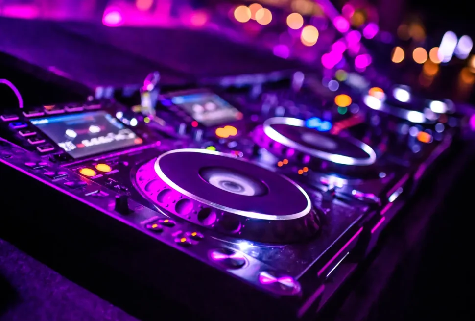 A DJ playing music in a club. Kenya Nights A Guide to the Best Nightlife Experiences