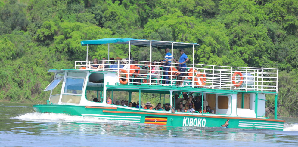 Tourists on a boat cruise across Murchison falls national park